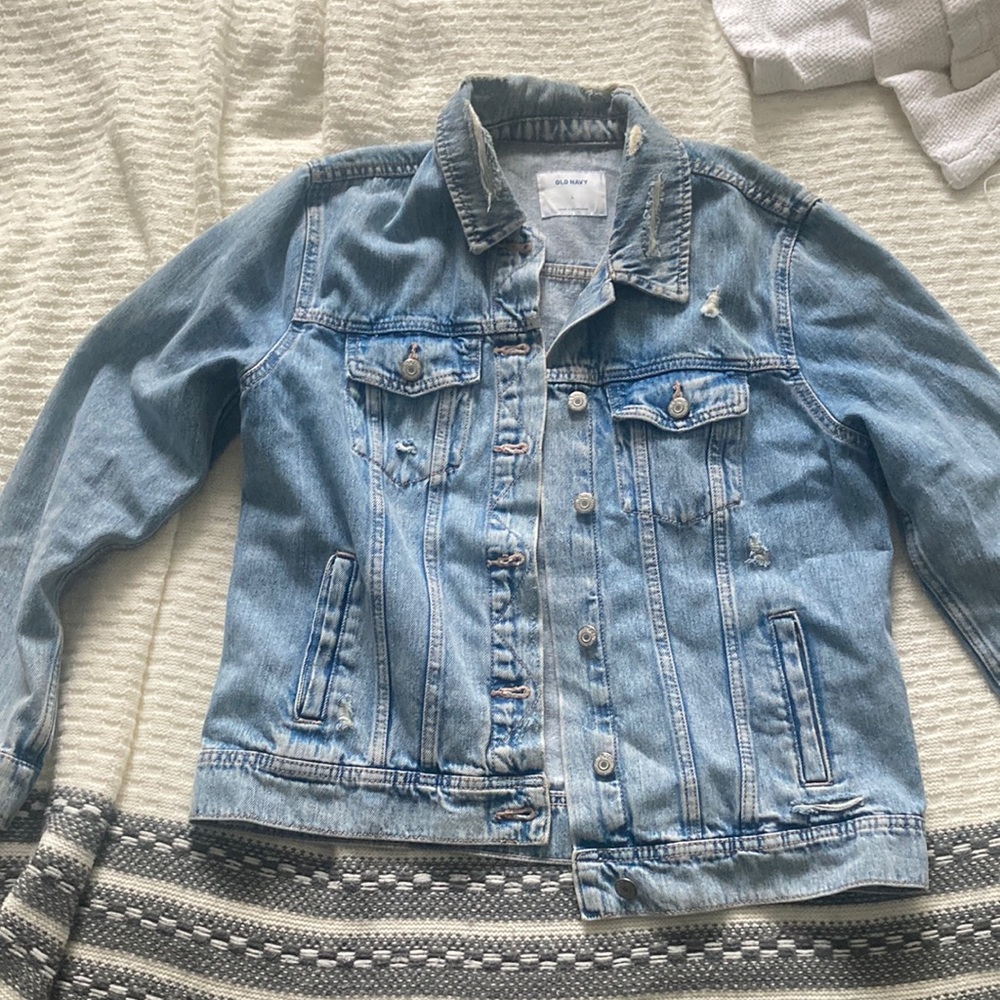 Lightly distressed blue denim jacket